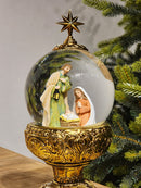 GLOBO DE NEVE COM SAGRADA FAMÍLIA DOURADO LUZ E MOVIMENTO 26,5CM